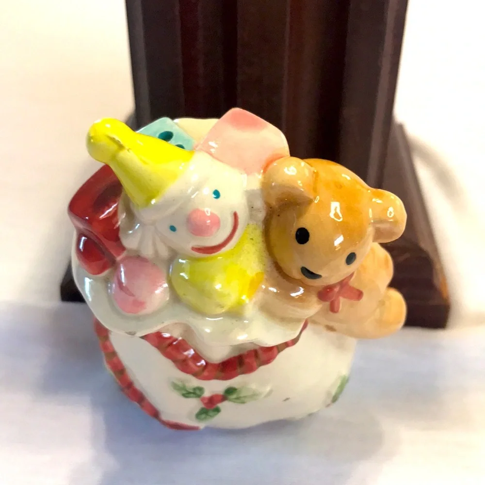 Vintage Fitz and Floyd ceramic Christmas shaker decor.